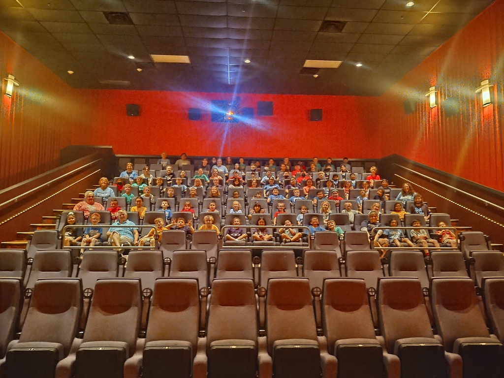 Grace students waiting for the movie to begin.