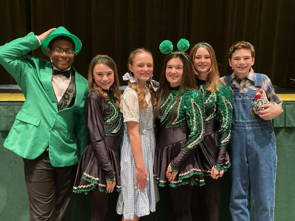 Grace students posing for a picture after The Wizard of Oz.