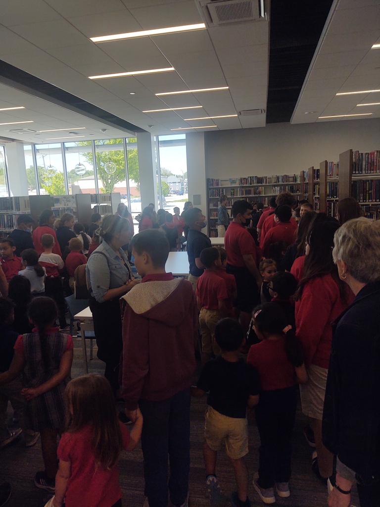 Students looking at books
