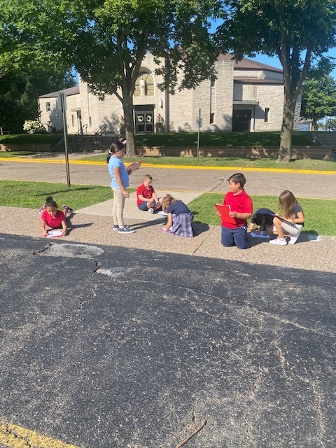 Students working together outside.