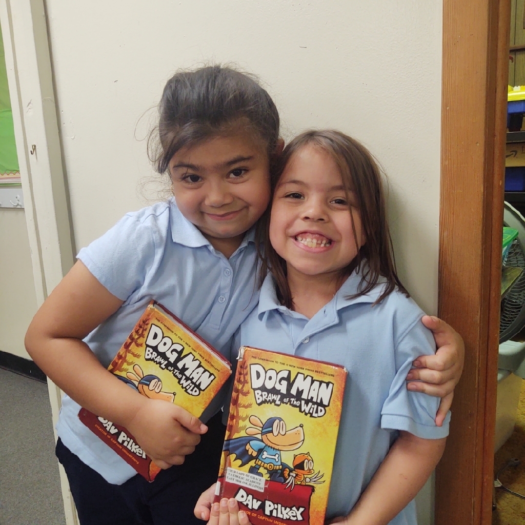 Students checking out books in the library.