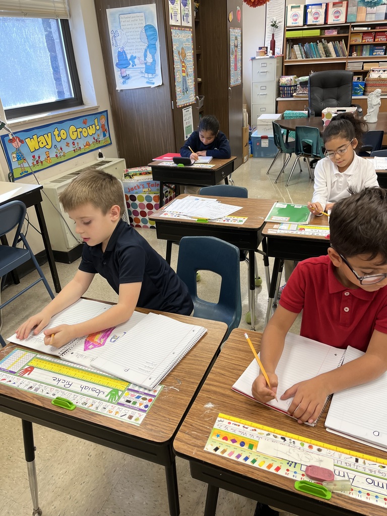 1st graders writing sentences